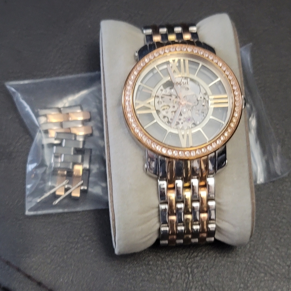 Fossil gold/silver watch.